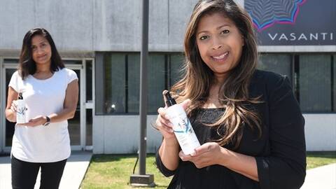 woman holding box of cosmetic
