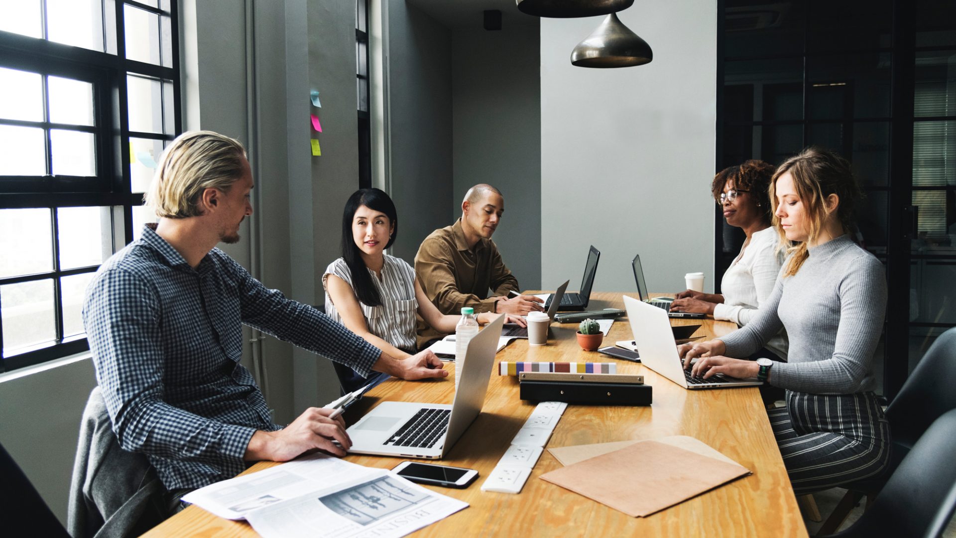 Professionals working at a table