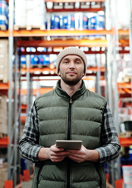 Man in Logistics Warehouse