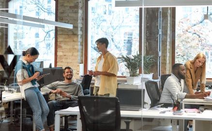 Successful team at work. Group of mixed race business people working together in the creative office This is a decorative photo workspace