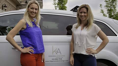 image of kristen standing by her car