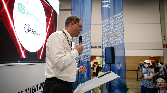 Syntronic making announcement at Collision
