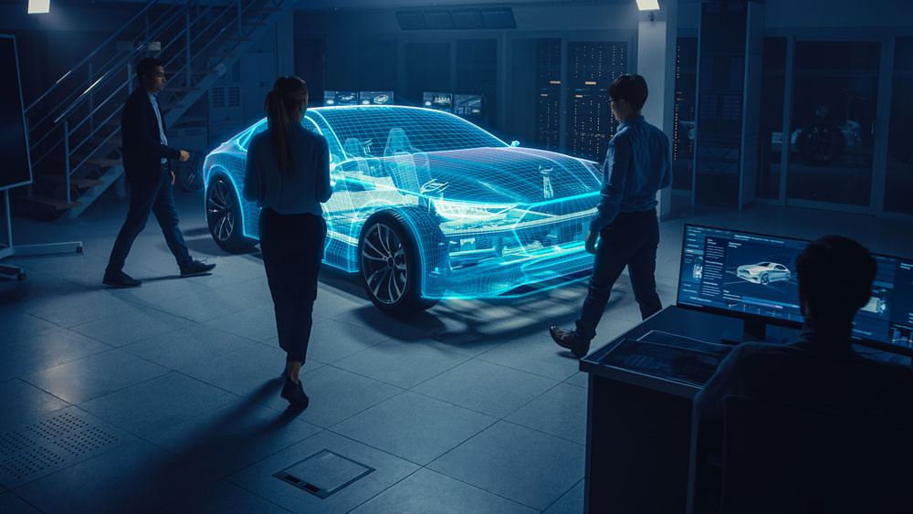 Engineers walking around the car