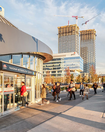 The Vaughan Metropolitan Centre with people heading to subway.