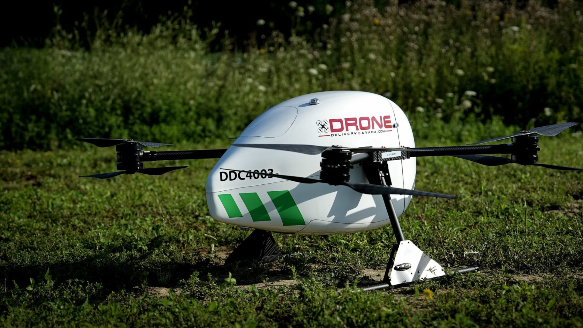 Drone Delivery Canada canary drone parked on grass
